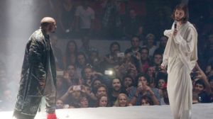 Kanye at a recent concert talking to "Jesus."  I still think it would have been more radical if he had imaged Jesus other than that of a white guy.