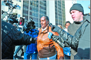 Annie Ricks walks out of 1230 Burling for the last time as Cabrini-Green's high-rise was closed. | Brian Jackson~Sun-Times